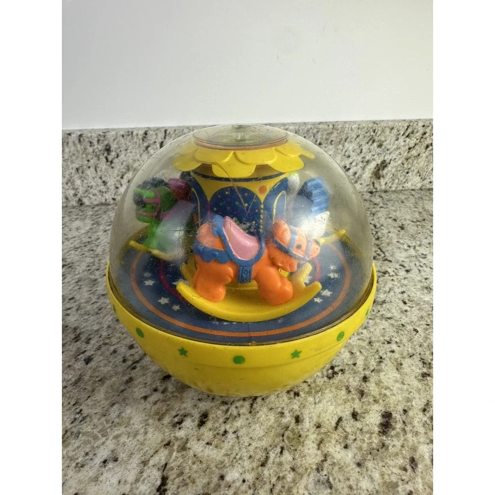 Vintage 1985 Fisher Price Roly Poly Chime Ball Carousel Yellow 1150 nostalgia